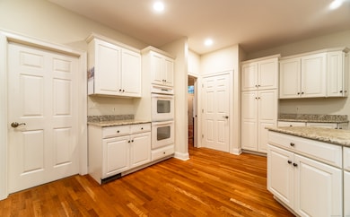 Kitchen offers hardwood floors
