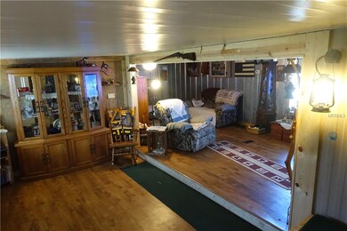 Entrance room with living room to the right.