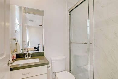 Full bath with gorgeous stone shower and sliding d