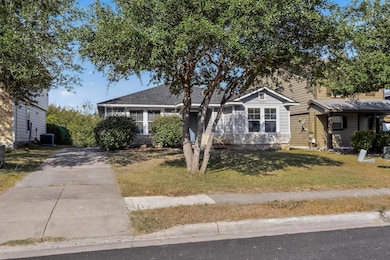View of front of home featuring a front lawn and driveway