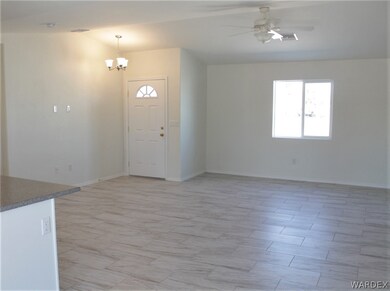 Wide open floorplan with tile flooring.