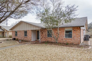 Different view of front yard and side yard with st