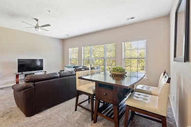 Dining space with visible vents, baseboards, ceili