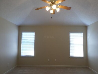 Master Bedroom features a vaulted ceiling, new car