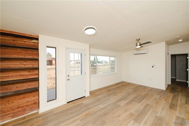 Foyer entrance featuring a wall mounted air condit