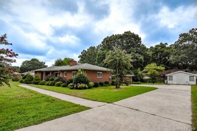 Half acre flat lot and a wired shed!
