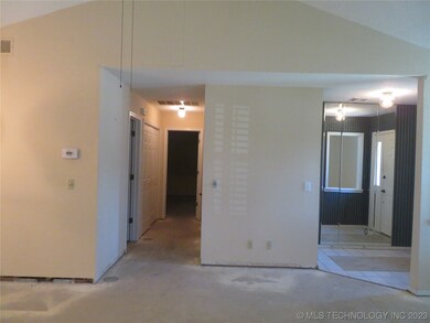 View from living room to entry and hallway to 2nd