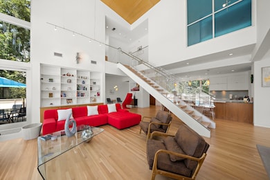 Inviting family room with tall ceilings and sleek