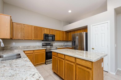 plenty of cabinets and pantry in kitchen