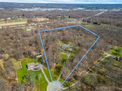 Approx 6.8 acres with approximately half wooded pr