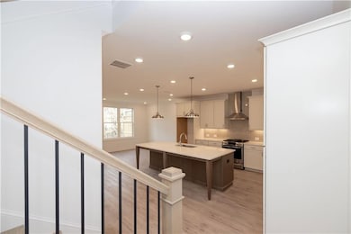 Welcome to the Stockton floorplan at homesite 164! Coming into the home, kitchen, family and dining room all open concept has an easy flow on the main level. Pictures represent a previously built home, not the actual home.