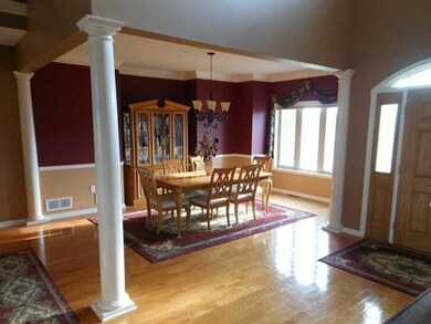 Dining Room formal dinning room with pillars, crow