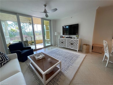 Living area featuring light tile patterned floors,