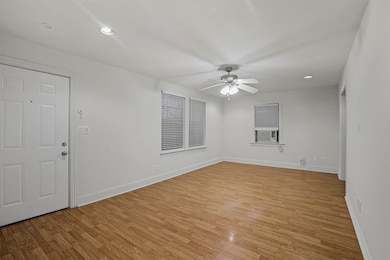 Spare room with recessed lighting, light wood-style flooring, and ceiling fan