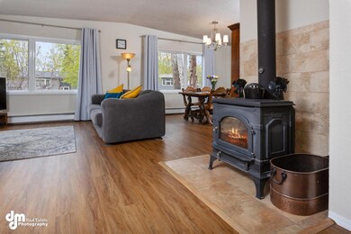 Wood Stove Warms Open Living/Dining