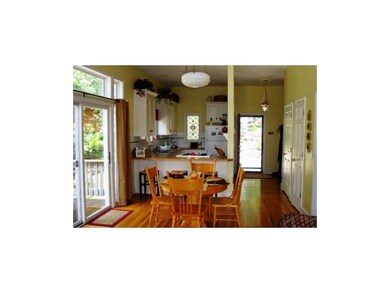 Open kitchen with a breakfast bar. dining area & d