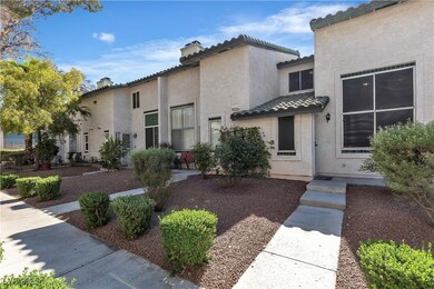 View of front of home with a tile roof, stucco sid