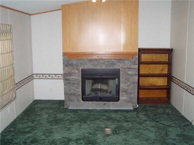 Family Room. Log Burning Fireplace in the Sunken F