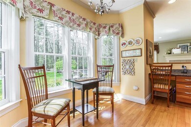 With bay windows to the back yard, this kitchen is
