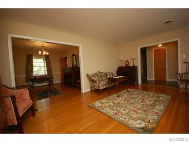 Living room connects to the dining room.