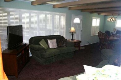 Living room with eating area. All newer shutters, 