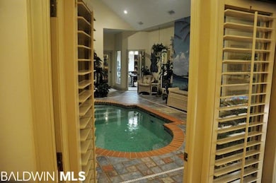 The pool can be viewed from both wings of the house, the master beddroom and 1 of the guest bedrooms