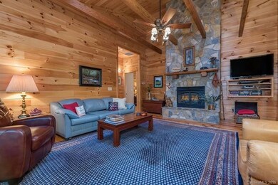 Family room with cathedral ceiling, skylights, and