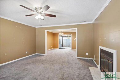 The living room opens to the dining room.