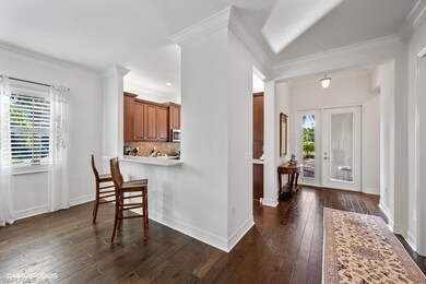 Foyer, dining area and counter top seating.