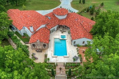 Day view of the stunning home and property.