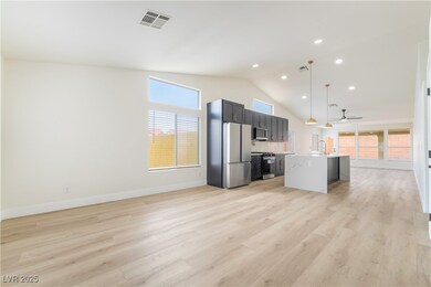 Kitchen with backsplash, a sink, appliances with s