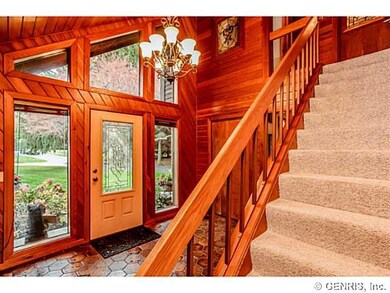 Foyer. A two story foyer features an open stairway