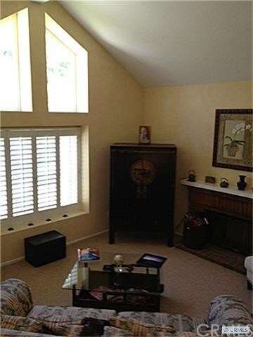Living Room with Fireplace and Vaulted Ceilings