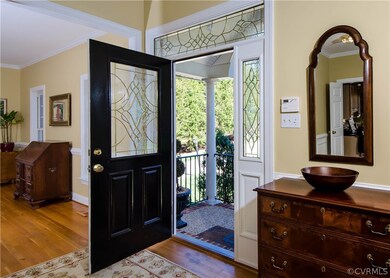 Detailed window design surrounding the door offers