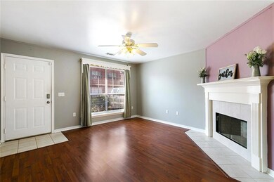 Living area with  wood laminate floors and large p