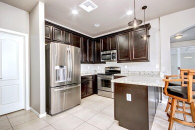 6 upgraded cabinets granite & stainless
