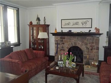 Living Room. Stone Gas Fireplace. 2 window walls o