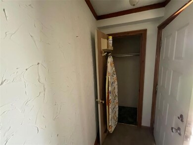 Unfurnished bedroom with a closet