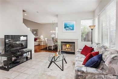 Cozy fireplace in spacious separate family room.
