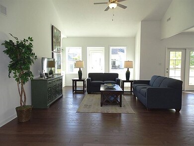 Hand scraped hardwood floor in the foyer, FR, DR &