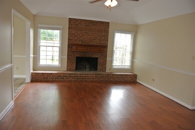 Laminate wood floors in the great room, along with