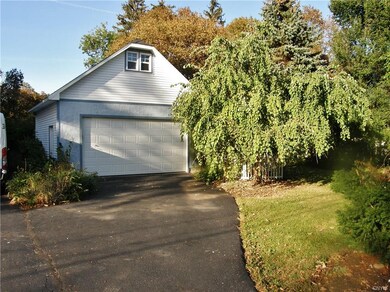 Recently built garage has full stairs to upper lev