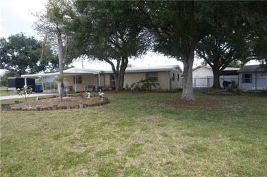 House is on a extra large corner lot and has a fen