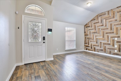 FRONT ROOM WAS USED AS AN OFFICE AREA