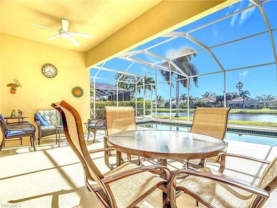 Sunroom / solarium with ceiling fan, a pool, and a