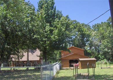View from drive of home and garage with apartment
