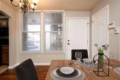 Dining area featuring dark wood-type flooring and 