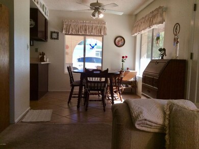 LIVING ROOM AREA TOWARDS EAT IN KITCHEN