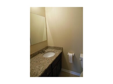 Updated main level full bath, granite counter