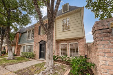 Corner unit with a beautiful tree on the front yar